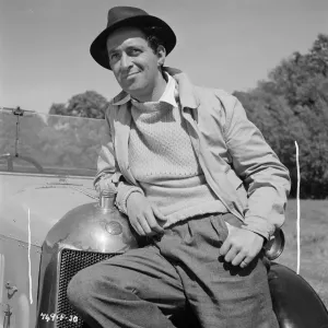 Colour portrait print of John Gregson as Gordon in a smiling pose