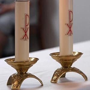 Candles in a Roman catholic church during Espiritu Santo Festival in Vila Novo