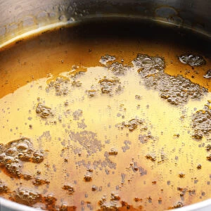 Caramelised sugar in pan, close-up