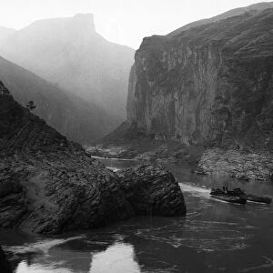 Two cargo ships in chu-tang gorge, one of the three gorges of the yangtze river, szechuan province, china, 1950s