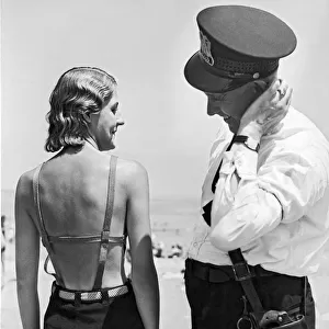 A Cop Polices Bathing Suits