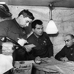 Lt, general vasili chuikov (2nd from left) giving an assignment to the commander of the 13th guards rifle division, major general alexander rodimtsev (far right), in the command post bunker of the 62nd army in november 1942, stalingrad, also present are major general n, i, krylov (far left) and member of the military council, lt, general k, a, gurov (2nd from right)