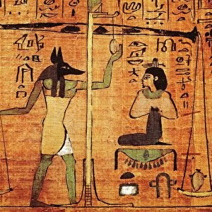 Papyrus from The Book of The Dead, Anubis during the weighing of the souls (psychostasy)