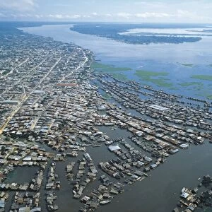 Peru, Loreto Region, Aerial view of Iquitos on Amazon River