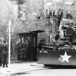 Repeatedly, the u, s, -ultras in west berlin threatened the security of the gdr population in the capital with open provocation, american tanks are stationed at the border crossing point in friedrich strasse and have directed their guns against democratic berlin, the latest news shows how important the german peace treaty and a demilitarized, neutral free town of west berlin is, october 1961