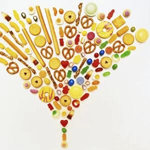 A selection of sweet and savoury foods arranged in a fan pattern