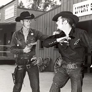 Sheriff with gun stopping cowboy