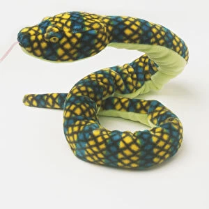 Slithering stuffed toy snake, close up