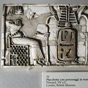 UK. London, Ivory plaquette representing two figures sitting on throne, found in Nimrud, Iraq