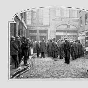 Unemployed workers queuing up at soup kitchen
