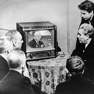 Workers of the state bearing plant no, 1 in moscow, watching nikita khrushchev give a report at the ussr supreme soviet on the present day international situation and the foreign policy of the soviet union on a tv set at the factorys house of culture