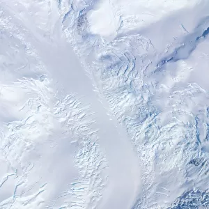 Aerial image of a glacier and crevasses, Antarctica