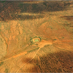 An Aerial view of the Australian outback, showing the vibrant colours of the Landscape