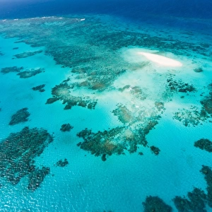 Aerial view of coral cay and Great Barrier Reef