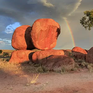 Rainbow over Karlu Karlu / Devils Marbles Conservation Reserve. Northern Territory. Australia