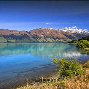 Reflections in lake Wakatipu, South Island, New Zealand