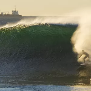 surfer surfing a wave on the east coast of australia