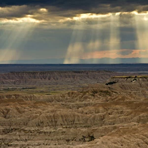 Approaching storm and sunbeams, Badlands National Park, South Dakota, USA