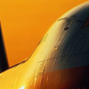 Boeing 747 passenger aircraft at sunset, close-up