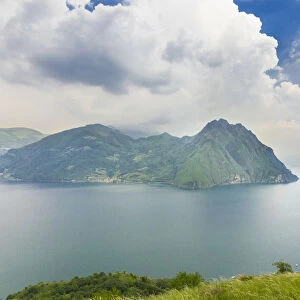 Corna Trentapassi, 1248m, and Monte Isola island in Lake Iseo or Lago d Iseo, Castro, Bergamo, Italy