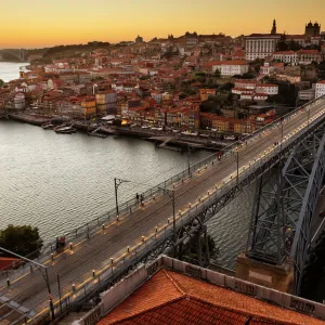 General view of Douro river and city of Oporto al sunset. Porto (Oporto), Portugal