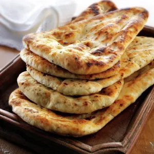 Indian naan bread with garlic and coriander