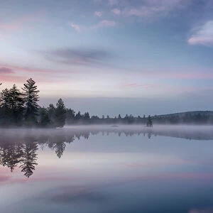 Morning reflections on Lake Durant, Adirondack Mountains, New York State, USA