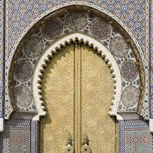 Morrocco, Fez, decorative arched doorway inlaid with tiles
