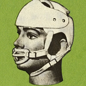 Person Wearing a Helmet and Mouth Guard