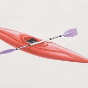 Red kayak and double-bladed paddle
