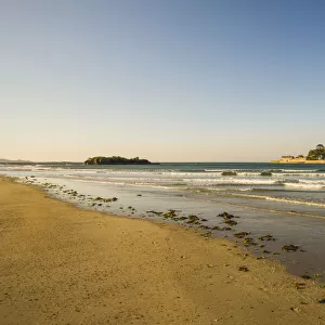 Sand beach with the island of St. Michaels Mount at high tide, Marazion, Cornwall, England, United Kingdom