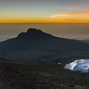 Scenic sunrise view of glaciers at Uhuru Peak, Kibo, with Mawenzi in the background, Mount Kilimanjaro, Kilimanjaro Region, Tanzania