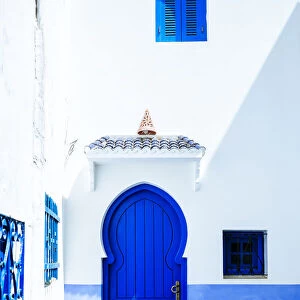 Typical blue house door in Chefchaouen, Morocco