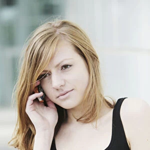Young woman speaking on her mobile phone
