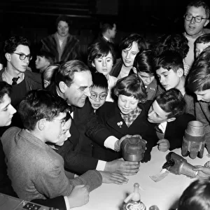 29th December 1960 Dr T. F. Gaskell of the British Petroleum Company, showing schoolchildren