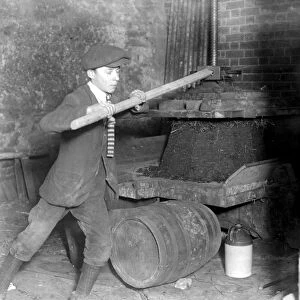 Cider Making in Devonshire. The old fashioned hand press. 5 November 1922