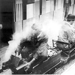 The Duke and Duchess of York enjoying a ride on the Canadian Pacific Railway Miniature Railway