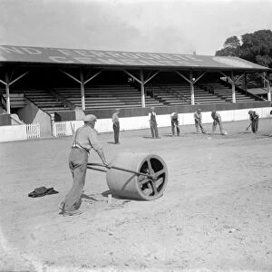 Groundsmen at work on the Northfleet Football ground. 1935