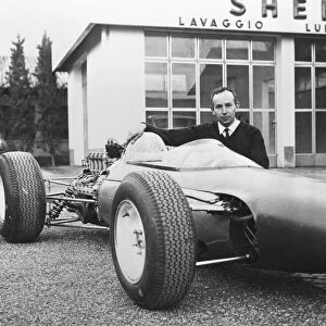 John Surtees pictured here with the new Ferrari Formula One racing car. April 7th