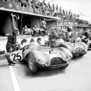 Le Mans 24 Hour Race The Aston Martin team before the start of the race - cars 25