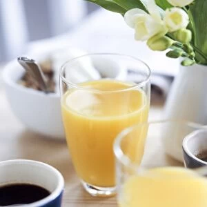 Orange juice as part of a light healthy breakfast credit: Marie-Louise Avery /