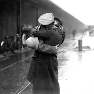 Print of a woman greeting her husband at King George V Dock, London Print of a woman greeting her husband at King George V Dock, London
