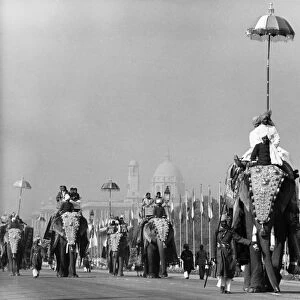 Royal Tour of India. In Delhi, along the Rajpath, a convoy of magnificently decked
