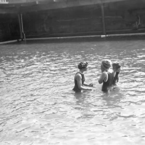 Swimmers in the open air swimming pool at Westcliff - on - Sea, Essex