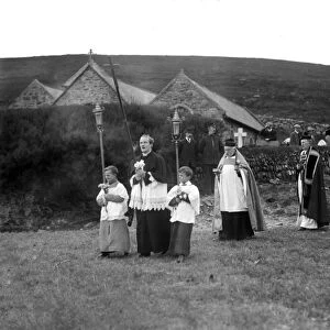 Procession across the beach at Gunwalloe Church Cove, Cornwall. Early 1900s