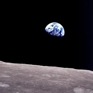 Rising Earth about five degrees above the lunar horizon