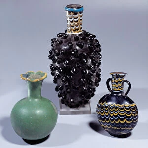 Ancient Egypt: Vases and vials of opaque glass in the shape of pomegranate