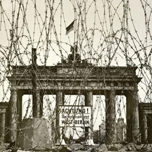 Barbed wire in front of the Brandenburg Gate, Berlin, Germany, during the Allied occupation of the city after World War II (b / w photo)