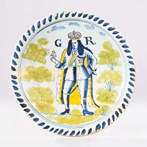 A Bristol Delft polychrome royal portrait charger painted with a full length portrait of