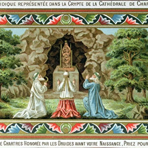 Druids praying at a statue of the Madonna and Child on the site of the grotto at Chartres